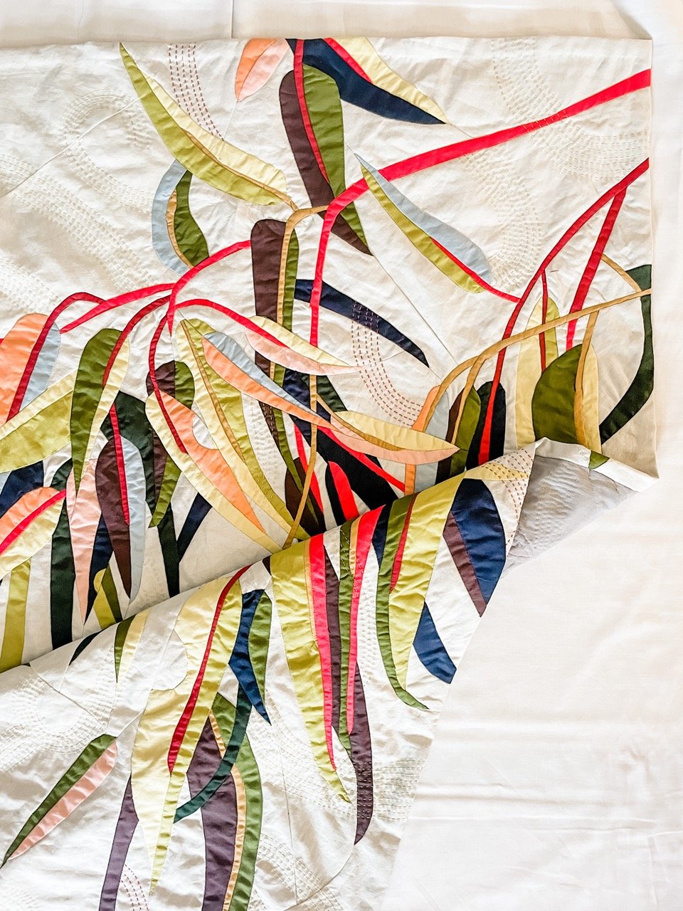 Gum leaf themed art quilt by Ruth de Vos